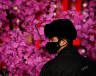 2017年1月3日，北京，一名戴著口罩的安保人員。攝影：Thomas Peter